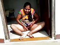 Mature Indian aunt masturbates outdoors