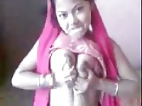 Indian youngster plays with tits