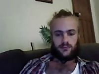 Bearded man jerking off his cock in cam show