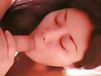 Horny Asian girl enjoys the taste of man’s cock