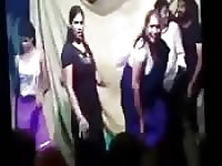 Indian women flirt and flash while dancing