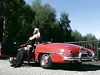Screwing a blonde on a red car